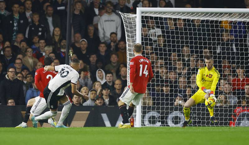 United goalkeeper David de Gea saves from Fulham's Carlos Vinicius. Reuters