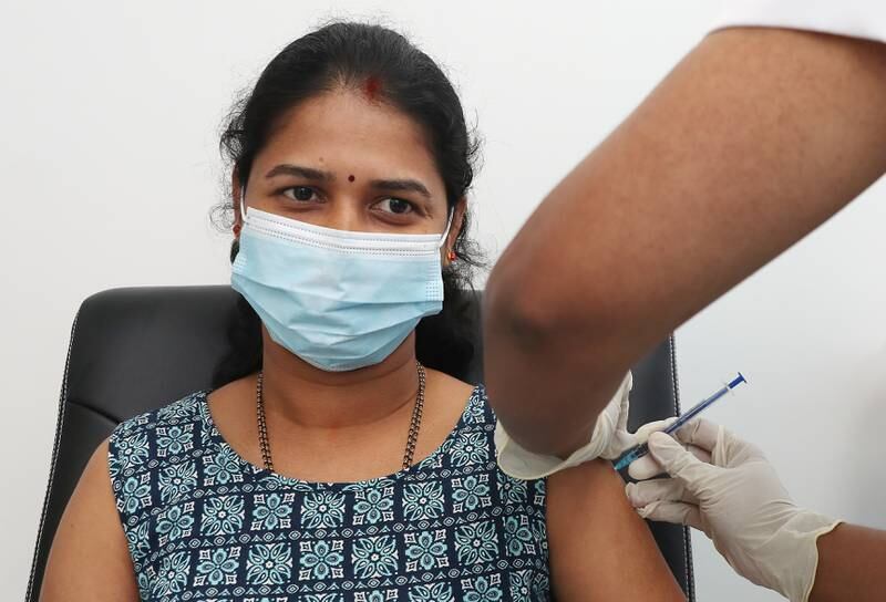 Ranjani Poojari receives her Pfizer Covid-19 vaccine at the NMC Royal Hospital DIP in Dubai.