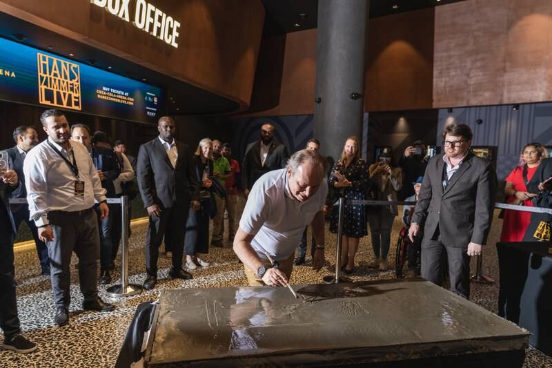 Zimmer also signed and hand-printed a concrete block during his visit to Roxy Cinemas at Dubai Hills Mall