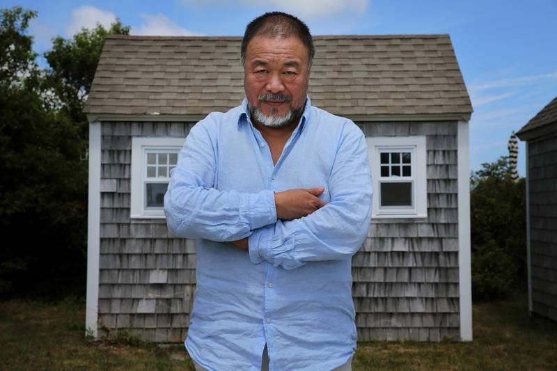 TRURO, MA - JULY 21: Artist Ai Weiwei poses for a portrait while visiting Truro, MA on July 21, 2018. Weiwei was on Cape Cod to receive the Distinguished Artistic Achievement Award from the Fine Arts Work Center in Provincetown, where he is exhibiting his work "Rebar and Case" through August 30. (Photo by Craig F. Walker/The Boston Globe via Getty Images)