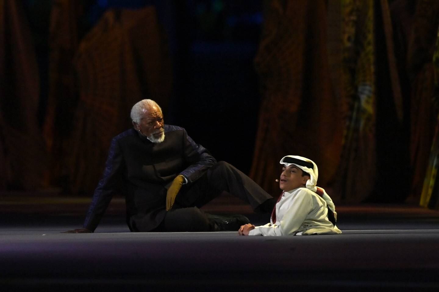 Morgan Freeman and Ghanim Al Mufatah on stage at Al Bayt Stadium. Getty Images