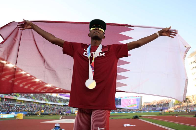 Gold medalist Mutaz Essa Barshim of Team Qatar celebrates after winning gold in the Men's High Jump Final. AFP