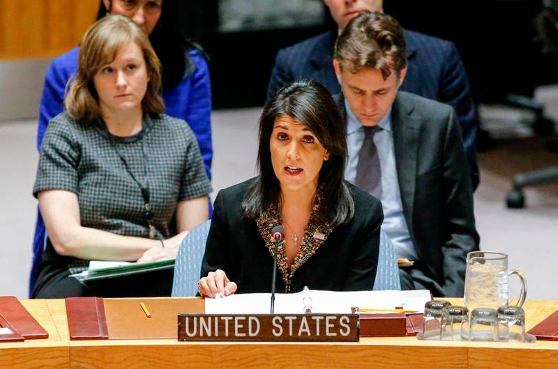 TOPSHOT - US Ambassador to the UN Nikki Haley speaks during a UN Security Council meeting over the situation in the Middle East on December 18, 2017, at UN Headquarters in New York. 
The UN Security Council is to vote on a draft resolution rejecting US President Donald Trump's recognition of Jerusalem as the capital of Israel. / AFP PHOTO / KENA BETANCUR