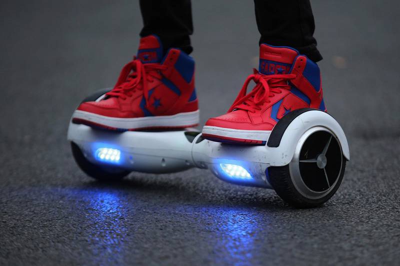 KNUTSFORD, ENGLAND - OCTOBER 13:  A youth poses as he rides a hoverboard, which are also known as self-balancing scooters and balance boards, on October 13, 2015 in Knutsford, England. The British Crown Prosecution Service have declared that the devices are illegal as they are are too unsafe to ride on the road, and too dangerous to ride on the pavement.  (Photo by Christopher Furlong/Getty Images)