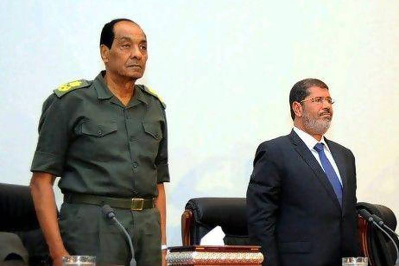 Egypt’s president Mohammed Morsi (right) and Egyptian Military Council chief Field Marshal Mohammed Hussein Tantawi. Many say Morsi’s new cabinet was aimed at avoiding any row that might detract from undoing what Islamists say is an excessive concentration of power in the military.