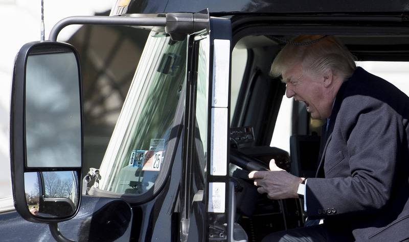 AFP presents a retrospective photo package of 60 pictures marking the 4-year presidency of President Trump.

US President Donald Trump sits in the drivers seat of a semi-truck as he welcomes truckers and CEOs to the White House in Washington, DC, March 23, 2017, to discuss healthcare. (Photo by JIM WATSON / AFP)
