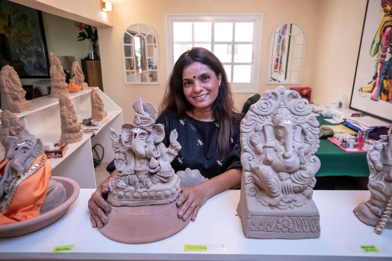 DUBAI, UNITED ARAB EMIRATES. 18 AUGUST 2020.  Savvy Kisani,  a Dubai resident who hand sculpts clay Ganesh idols at home. This is being advised for use during the current COVID-19 pandemic since the statues can be immersed in water at home and the clay can be used in gardens and in potted plants. Authorities have urged the Hindu community not to congregate in homes and against hiring boats and abras to immerse the Ganesh idol in the sea. (Photo: Antonie Robertson/The National) Journalist: Ramola Talwar. Section: National.
