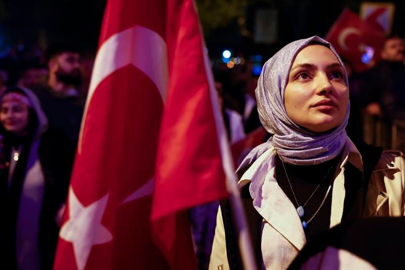 Supporters of President Recep Tayyip Erdogan gather at the AK Party's headquarters in Istanbul on election night. Getty Images