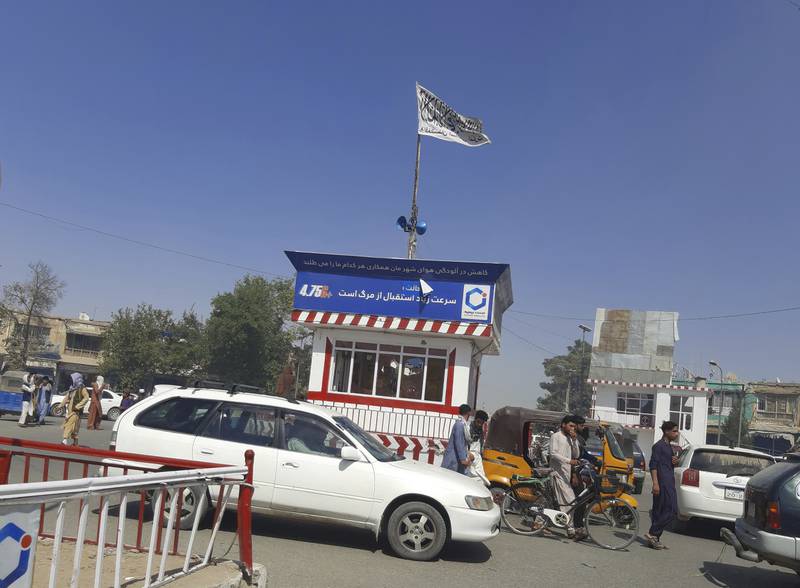 A Taliban flag flies in the main square of Kunduz city after fighting between the insurgents and Afghan security forces. AP