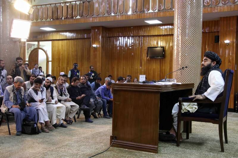 Zabihullah Mujahid, a Taliban spokesperson, at a press conference in Kabul. EPA