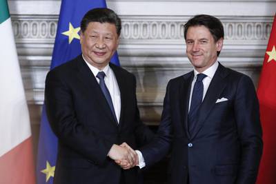 epaselect epa07458227 Italian premier Giuseppe Conte (R) shakes hands with Chinese President Xi Jinping during their meeting at the Villa Madama in Rome, Italy, 23 March 2019. President Xi Jinping is in Italy to sign a memorandum of understanding to make Italy the first Group of Seven leading democracies to join China's ambitious Belt and Road infrastructure project.  EPA/GIUSEPPE LAMI