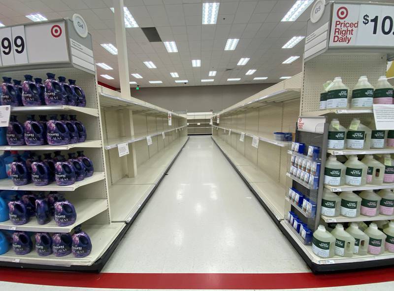 Empty shelving of toilet paper and paper towels is shown at a Target store in California. Reuters
