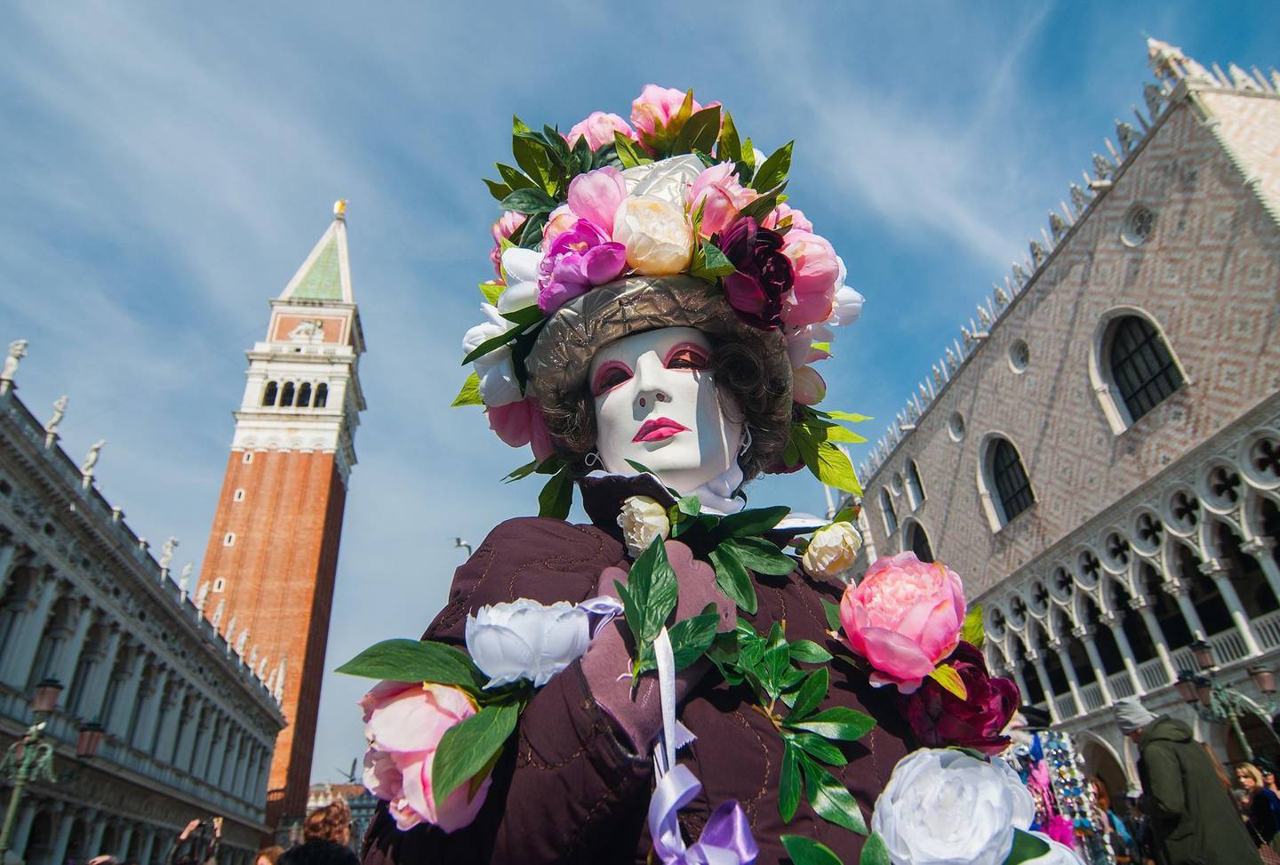 VENICE, ITALY - FEBRUARY 26:  A girl wearing carnival costumes poses during the 'Volo dell'Aquila' at Piazza San Marco on February 26, 2017 in Venice, Italy. The 2017 Venice Carnival runs from 11 to 28 February and includes a program of gala dinners, parades, dances, masked balls and music events.  (Photo by Awakening/Getty Images)