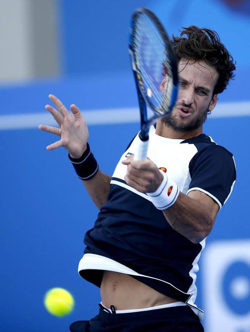 Feliciano Lopez, returns the ball to Kevin Anderson oduring match for the 5th place. Ali Haider / EPA