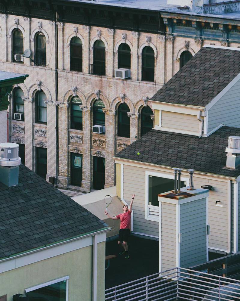 Photographer Jeremy 'Jerm' Cohen, who lives and works in Brooklyn, captures this moment of rooftop sport. Via @jermcohen / Instagram