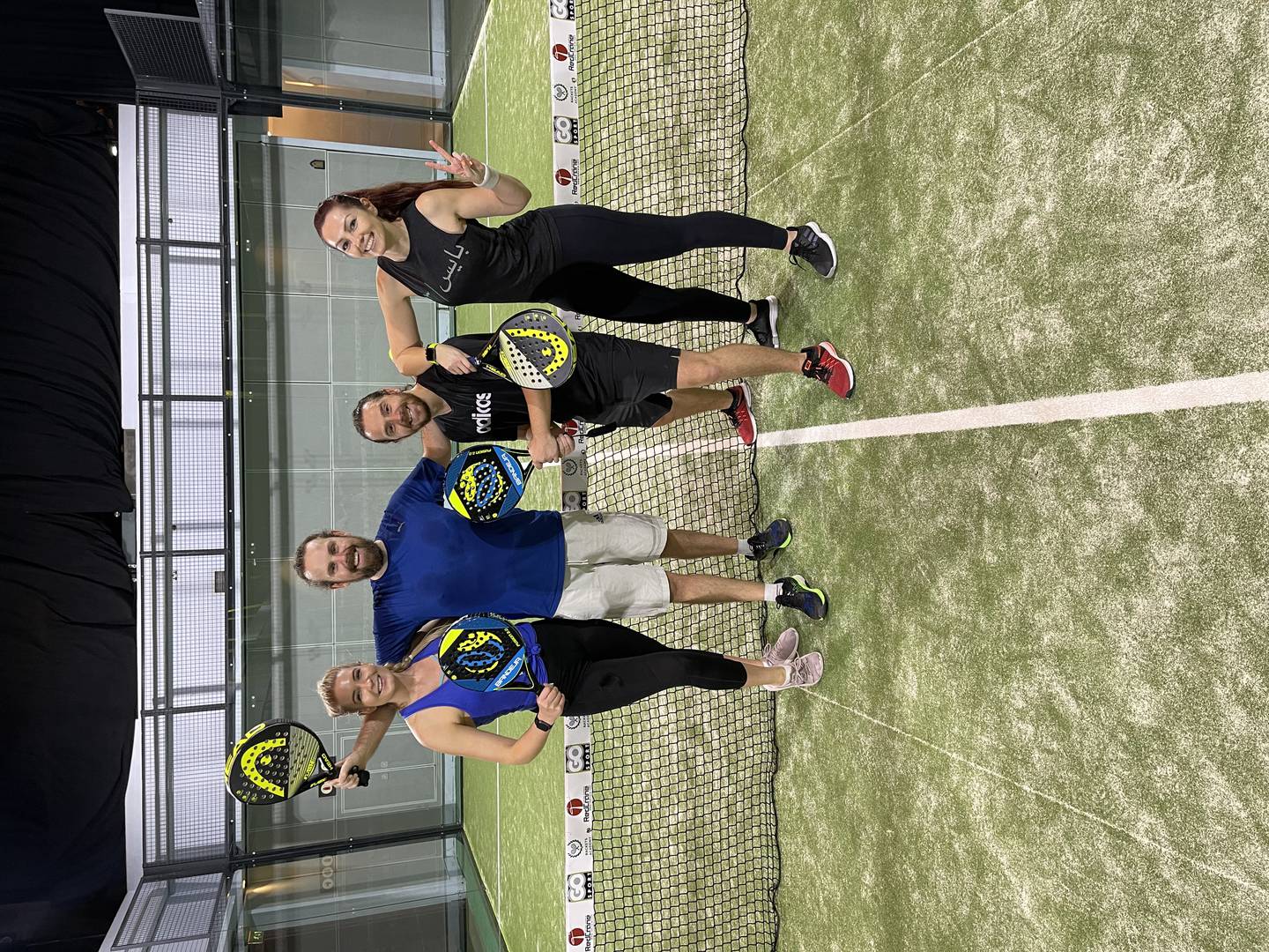 UAE TV presenter Katie Overy, right, with friends during her first padel experience. The sport is taking off in the UAE thanks to its sociability factor. Photo: Katie Overy