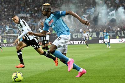 Napoli's Nigerian forward Victor Osimhen challenges Udinese's Brazilian defender Rodrigo Becao. AFP