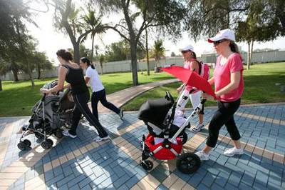 Sarah Moore, Maya Masri, Jo Hawi and Hilary O'Hagan participate in the Mummies with Buggies exercise class on the Corniche.