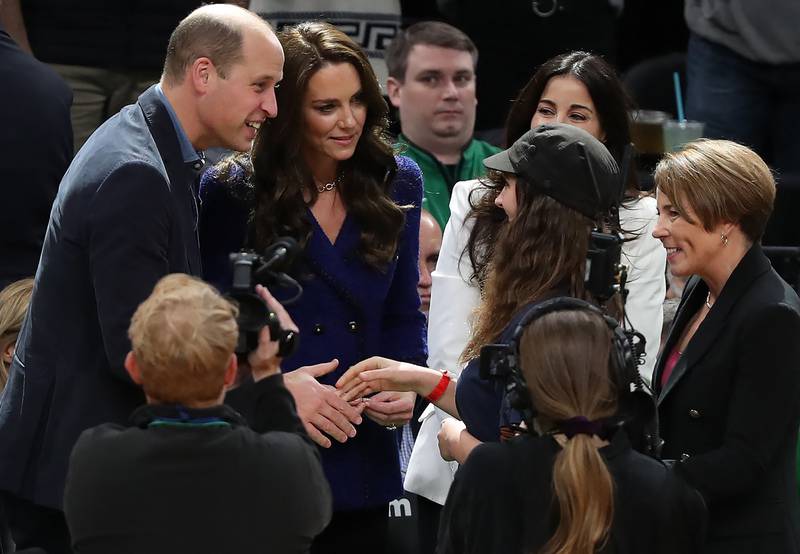 Prince William and Kate met Ollie Perrault, a 15-year-old climate activist, after she accepted the Heroes Among Us award at centre court during a game between the Boston Celtics and the Miami Heat. AFP