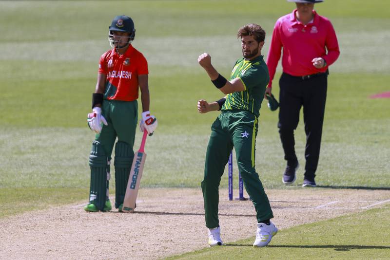 Shaheen Afridi celebrates after taking the wicket of Mosaddek Hossain. AP