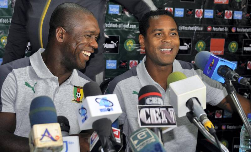 Newly appointed Cameroon coach, former Dutch international footballer Clarence Seedorf (L) and former teammate  Patrick Kluivert address a press conference in Yaounde on August 20, 2018. (Photo by Reinnier KAZE / AFP) / “The erroneous mention[s] appearing in the metadata of this photo by Reinnier KAZE has been modified in AFP systems in the following manner: [Seedorf] instead of [Seerdorf]. Please immediately remove the erroneous mention[s] from all your online services and delete it (them) from your servers. If you have been authorized by AFP to distribute it (them) to third parties, please ensure that the same actions are carried out by them. Failure to promptly comply with these instructions will entail liability on your part for any continued or post notification usage. Therefore we thank you very much for all your attention and prompt action. We are sorry for the inconvenience this notification may cause and remain at your disposal for any further information you may require.”
