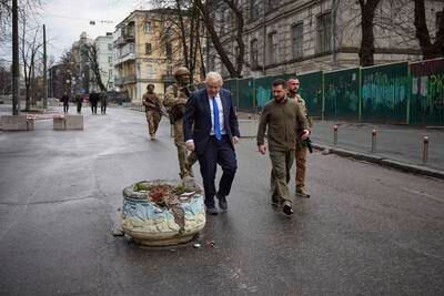 Mr Johnson and Mr Zelenskyy on a street in downtown Kyiv. AP