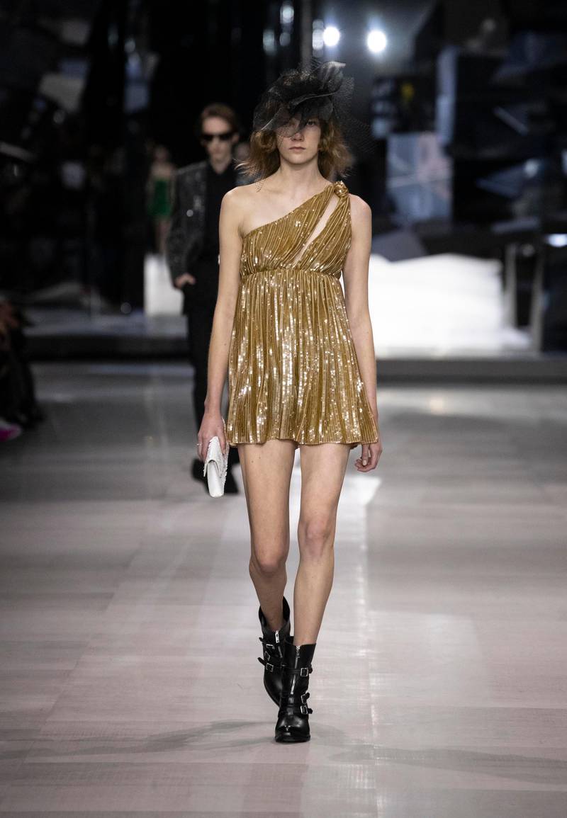 Designer Hedi Slimane returned to the runway with his first show as creative head of Celine. Celine