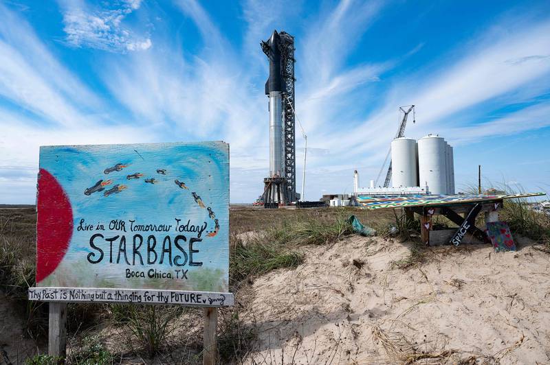 SpaceX's first orbital Starship SN20 is stacked atop its massive Super Heavy Booster 4 at the company's Starbase facility near Boca Chica Village in South Texas. AFP