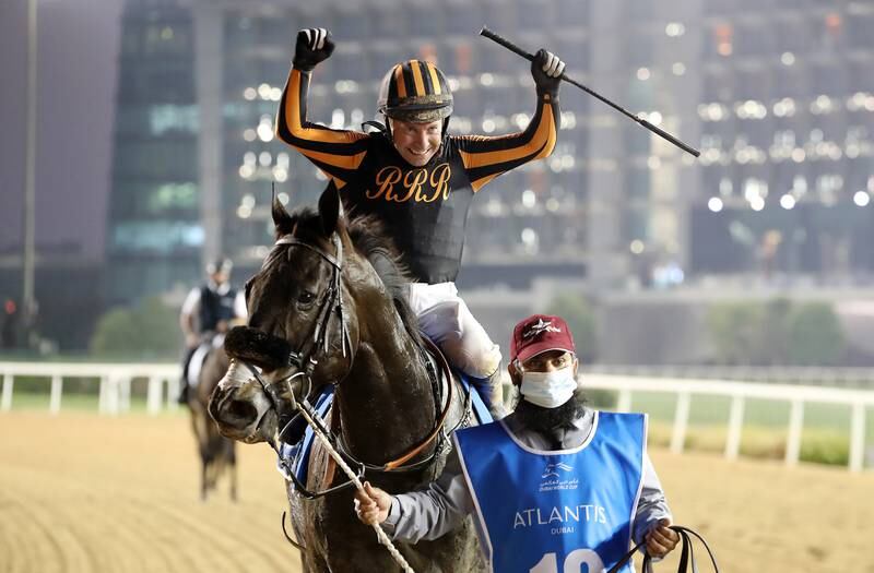 Tadhg O’Shea celebrates after guding Switzerland to victory in the Dubai Golden Shaheen. Pawan Singh / The National 