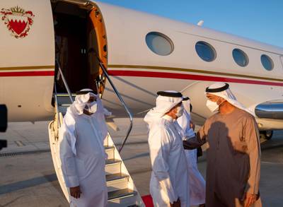 Bahrain's Crown Prince and Prime Minister, Prince Salman bin Hamad Al Khalifa is received by the Crown Prince of Abu Dhabi and Deputy Supreme Commander of the United Arab Emirates (UAE) Armed Forces, Sheikh Mohammed bin Zayed Al Nahyan upon his arrival to Abu Dhabi, United Arab Emirates. Bahrain News Agency