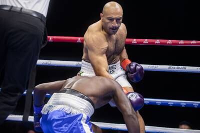 Mohammed Bekdash on his way to a win against Musa N'tege of Uganda in their heavyweight contest.