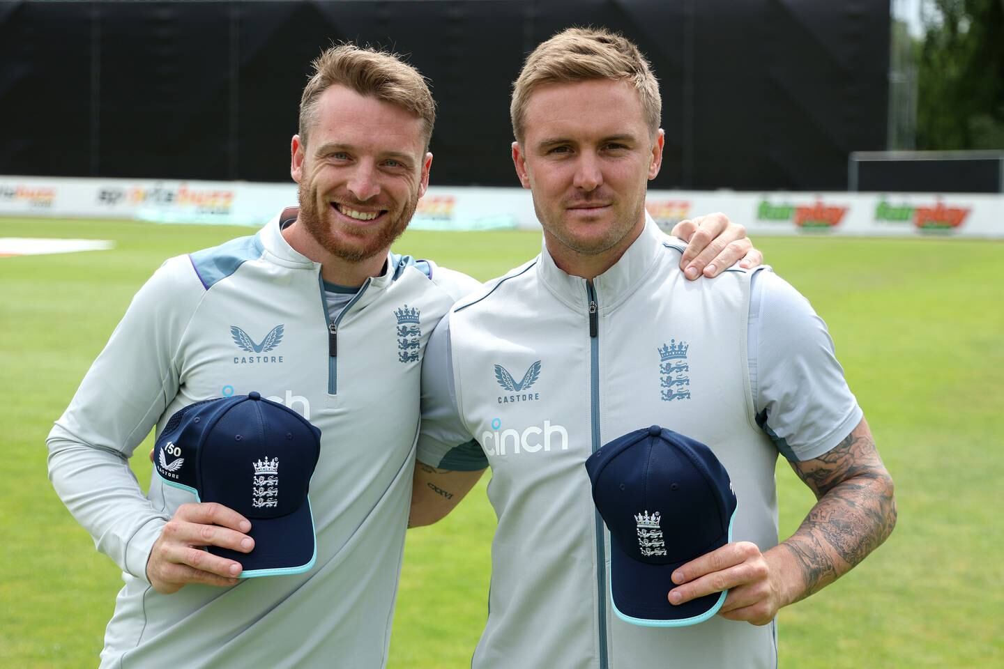 Jos Buttler, left, and Jason Roy celebrated their 150th and 100th ODI cap, respectively. Getty