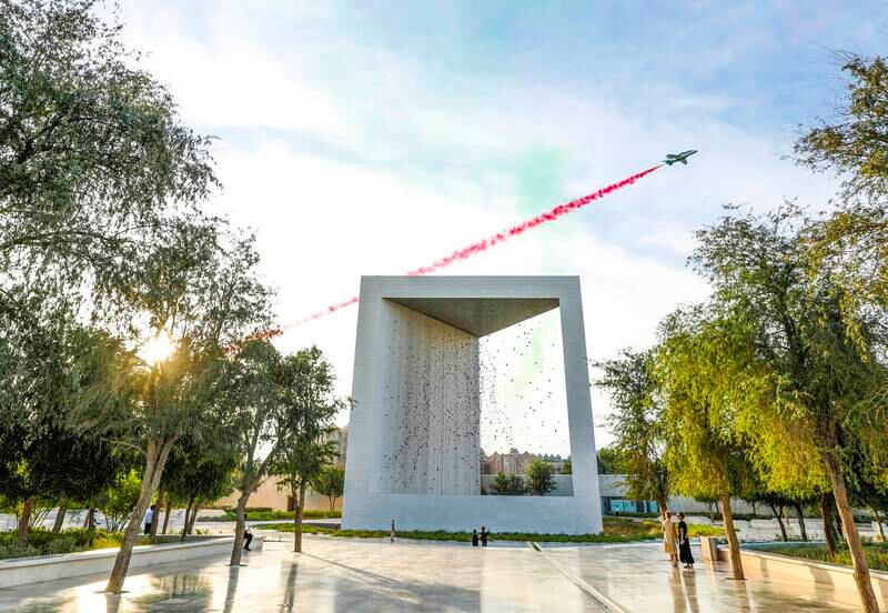A plane flies over the Founder's Memorial in Abu Dhabi, celebrating the 51st National Day. Wam