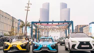 Car parade at Lusail boulevard before Iftar, which some say dates back to 1965. Doha, Qatar, 2023. 