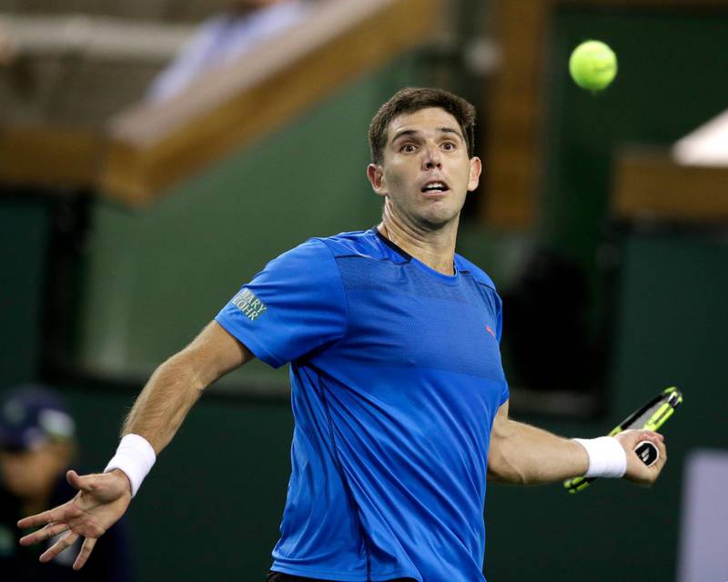 epa06590595 Federico Delbonis of Argentina in action against Ryan Harrison of the USA during the BNP Paribas Open at the Indian Wells Tennis Garden in Indian Wells, California, USA, 08 March 2018.  EPA/PAUL BUCK