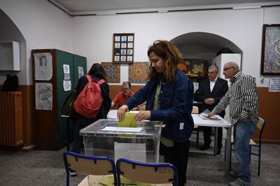 A woman votes in Istanbul. AFP
