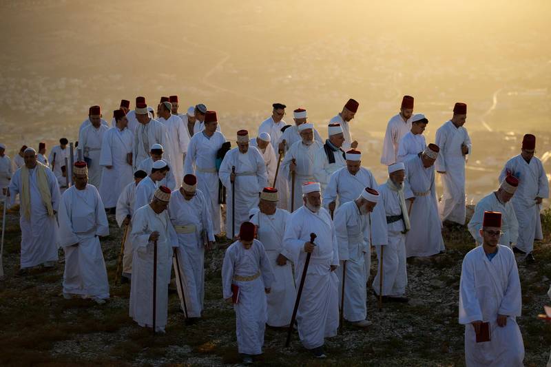 Members of the ancient Samaritan community attend a Passover pilgrimage at the religion's holiest site on top of Mount Gerizim, near the West Bank town of Nablus. AP Photo