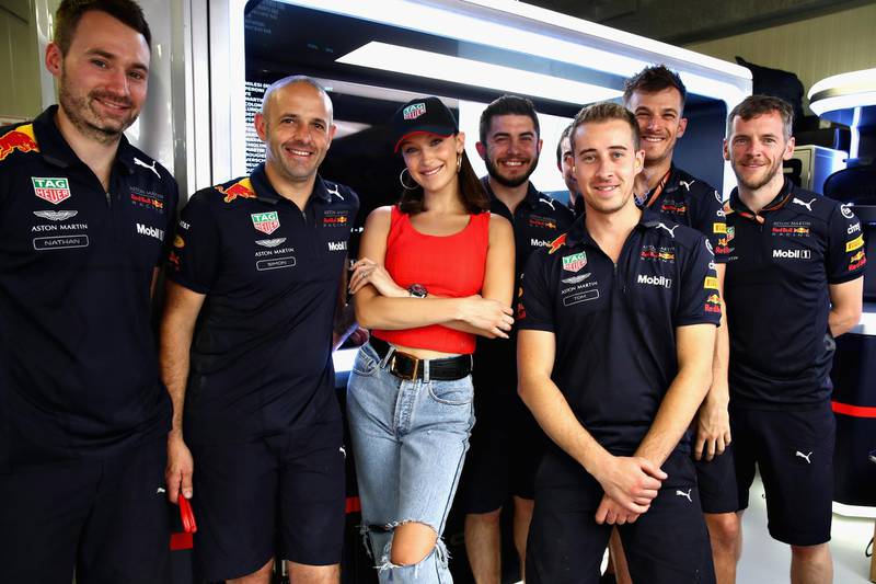 MONTE-CARLO, MONACO - MAY 27: Supermodel Bella Hadid poses for a photo with the Red Bull Racing team before the Monaco Formula One Grand Prix at Circuit de Monaco on May 27, 2018 in Monte-Carlo, Monaco.  (Photo by Mark Thompson/Getty Images)