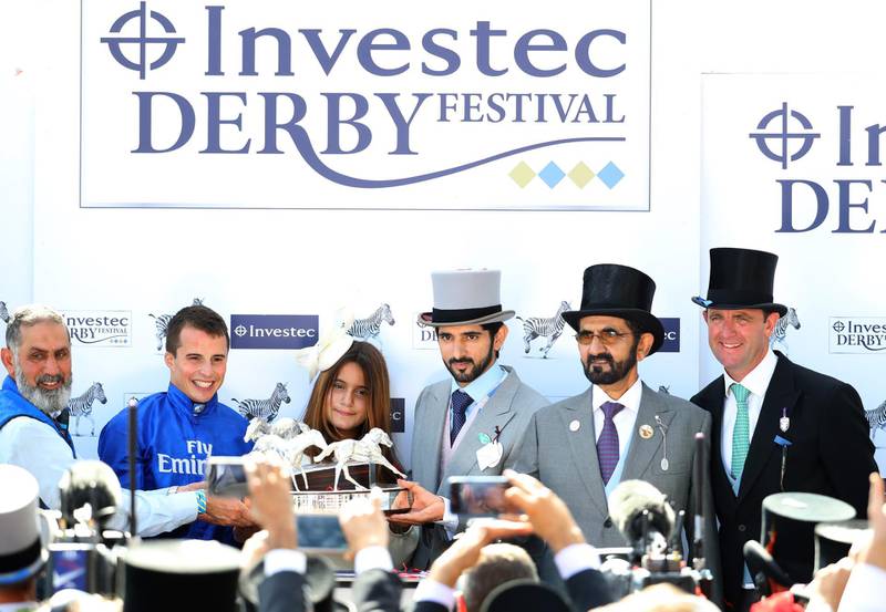 EPSOM, ENGLAND - JUNE 02:  (L-R) Jockey William Buick, Princess of Dubai Sheikha Al Jalila bint Mohammed Al Maktoum, Crown Prince of Dubai Sheikh Hamdan, Godolphin owner Sheikh Mohammed celebrates his horse Masar winning the Investec Derby race with trainer Charlie Appleby on Derby Day at Epsom Downs on June 2, 2018 in Epsom, England.  (Photo by Warren Little/Getty Images)