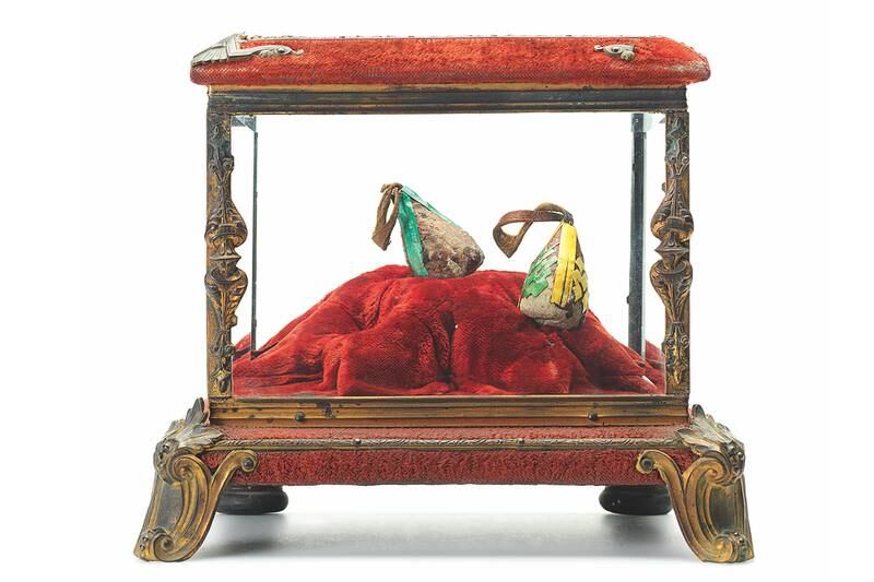 Ghubar-i Sherif (dust from the Kaaba) wrapped in raffia, and sitting inside a gilt and silver box on velvet; 19th-century Turkey. Photo: The Khalili Collections
