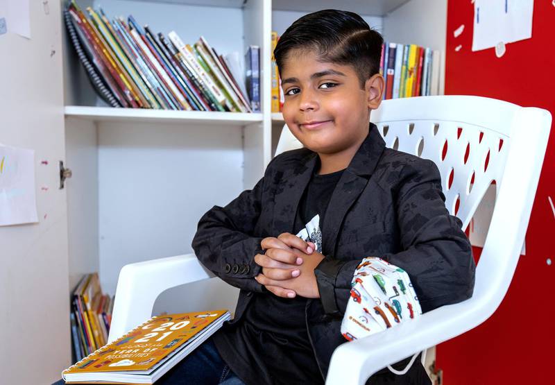 Ayaan Tariq, a 7-year-old in Al Ain has started a free library. He has a collection of around 300-400 books which he keeps in a cupboard. He lends these out to children free of charge. June 22, 2021. Victor Besa / The National.Reporter: Anam Rizi for News