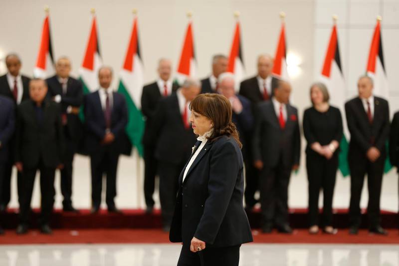 Mai Kaileh approaches the podium to be sworn in as minister of health in the new Palestinian government, in the Israeli-occupied West Bank town of Ramallah, on April 13, 2019.  Shtayyeh announced his new cabinet today alongside president Mahmud Abbas.
Several key positions were unchanged from the previous administration of Rami Hamdallah. / AFP / ABBAS MOMANI
