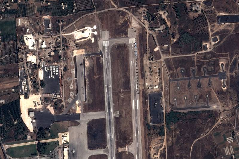 A Pleiades Satellite image from September 20, 2015, shows Russian fighter jets and helicopters at a military base in the government-controlled coastal Syrian city of Latakia. Syria said on September 22, 2015 it had received sophisticated new arms from Russia, including warplanes, and used them against rebels, as signs grew of a major shift in the country's four-year conflict. AFP