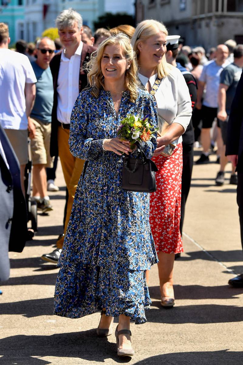The Countess of Wessex, wearing blue floral Me + Em, during a visit to Bangor in Northern Ireland on June 4, 2022. AFP 