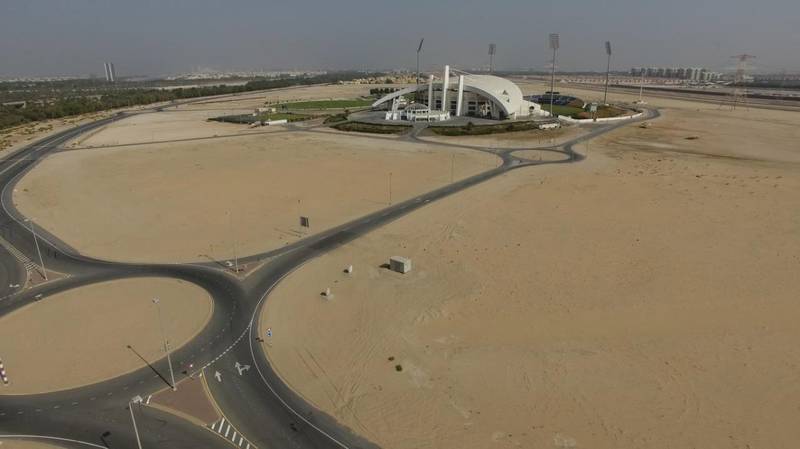 Zayed Cricket Stadium. Before and after shots of the grass fields surrounding the main arena. Photo: Abu Dhabi Cricket