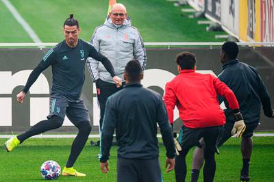 Juventus forward Cristiano Ronaldo, left, training with Juventus in Turin ahead of their Champions League match against Lyon. AFP