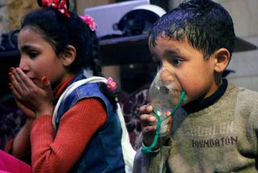 A child receiving oxygen through a respirator following an alleged poison gas attack in the rebel-held town of Douma, Syria. AP Photo