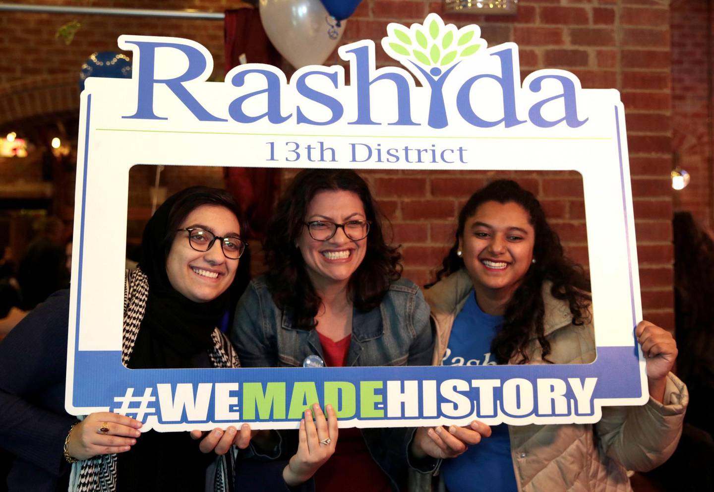 Democratic U.S. congressional candidate Rashida Tlaib (C) celebrates at her midterm election night party in Detroit, Michigan, U.S. November 6, 2018. REUTERS/Rebecca Cook