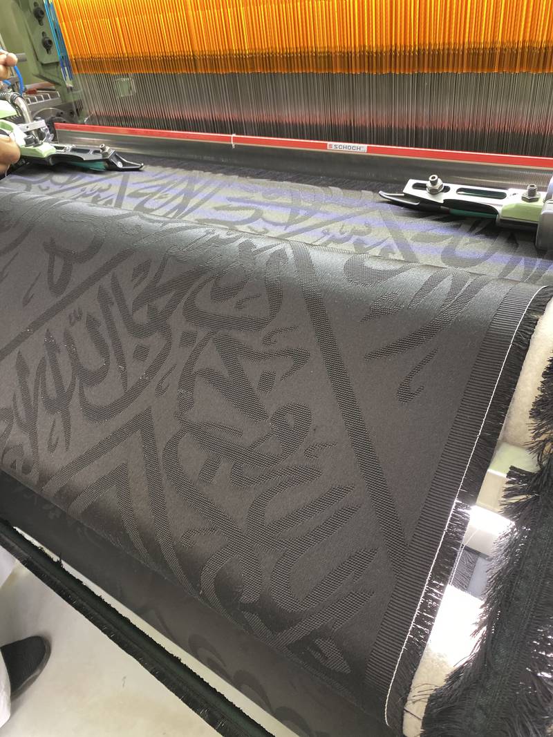 Loom Machine prepared the embroidered textile with verses such as "no God but Allah,' and 'glory to God'.