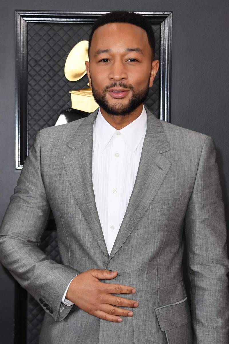 US singer-songwriter John Legend arrives for the 62nd Annual Grammy Awards on January 26, 2020, in Los Angeles.  / AFP / VALERIE MACON
